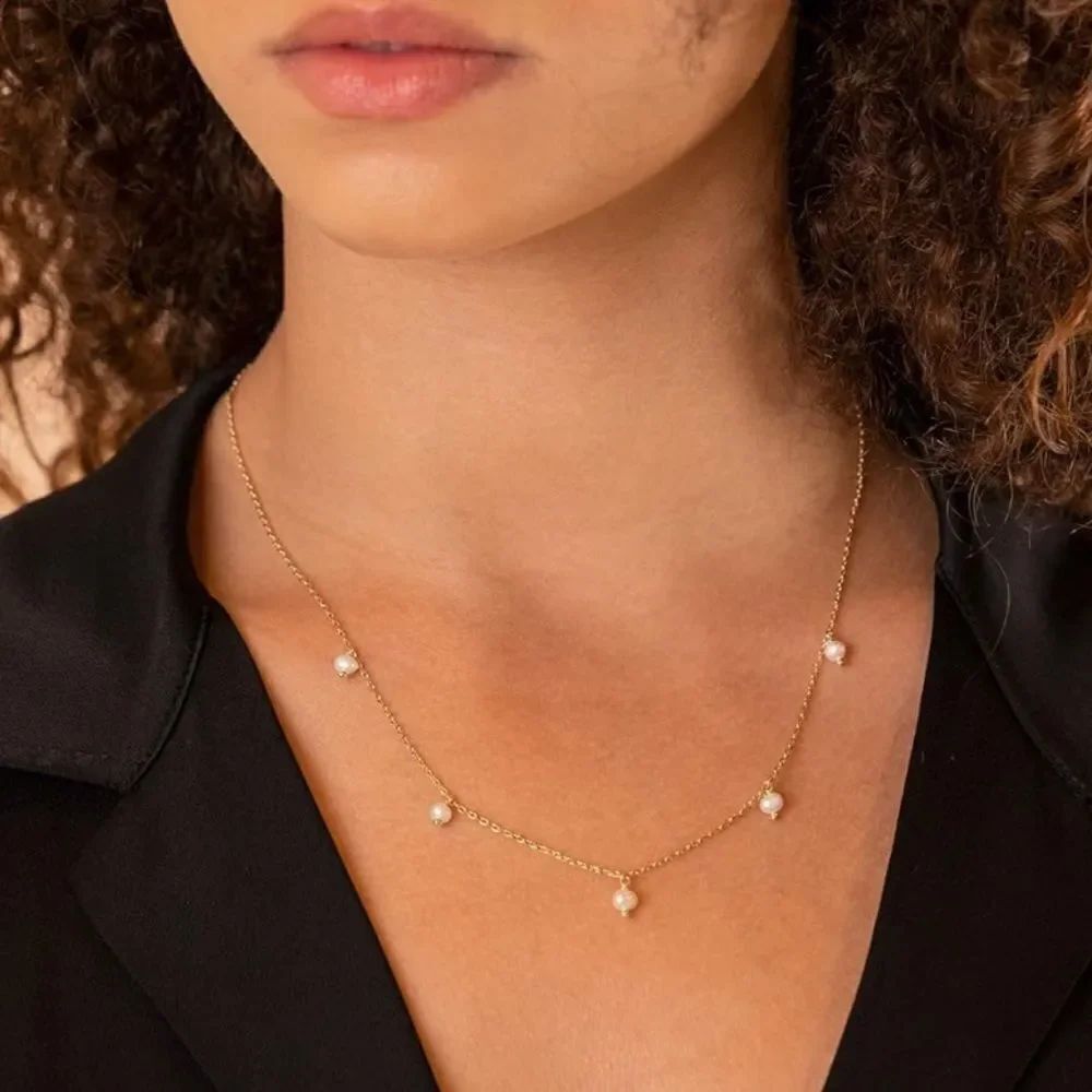 Gold floating pearl studded necklace